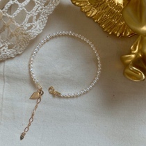 Light extravagant temperament natural transparent powder freshwater pearl handstring USA 14k bag gold leaf bracelet female minimalist hand decorated female