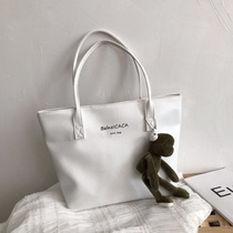 Shoulder bag female student schoolbag large capacity simple Hand bag Korean version of Joker ins bag large capacity true texture leather