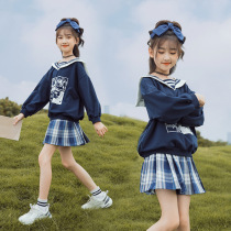  2021 new college style childrens suit girls autumn clothes middle and large childrens navy blue plaid short skirt two-piece hair generation