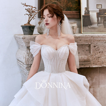 Donina wedding dress 202021 models trailing word shoulder bridal dress temperament Forest department starry sky super fairy dream European style