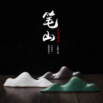 Creative ceramic pencashan brush supporting the wind and clouds falling light and shadow pen mountain study Four Treasures gift decoration pendulum calligraphy brush rest inch heart House