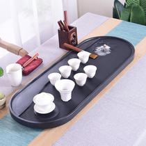 Natural black gold stone tea tray Kung Fu tea set Household simple dry soaking stone tea table set large tea ceremony tea sea