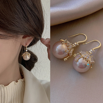 Earrings 2021 New goddess fan pearl earrings temperament Net red 2020 advanced sense French light luxury earrings tide