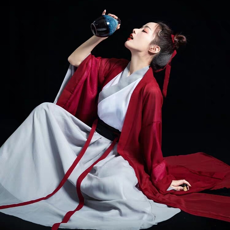 Red Traditional Chinese Hanfu Costume for Women, Elegant and Fairy-Like in Wei and Jin Dynasty Style, with Chinese Elements, Large Sleeves, and a Hat Red Traditional Chinese Hanfu Costume for Women, Elegant and Fairy-Like in Wei and Jin Dynasty Style, with Chinese Elements, Large Sleeves, and a Hat