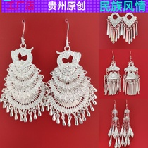 Miao Dong classical retro court earrings Design sense earrings Stage Miao clothes decorations Peacock earrings