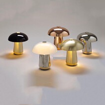 Desk lamp of bedside hotel in the bedroom of the modern Nordic simple living room after the metal mushroom table lamp