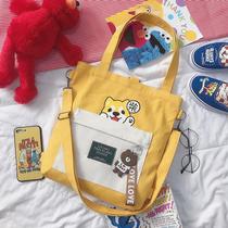 Canvas bag large capacity female crossbody fashion primary and secondary school students handbag Junior high school students men and women portable cartoon bag