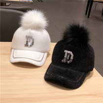 Hat female fashion trend Korean rhinestone D letter Joker hairball baseball cap autumn and winter warm casual duck tongue