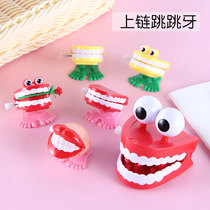 Decompression clockwork toys creative tricky small toys 5 yuan children spoof Funny chain jumping big white teeth
