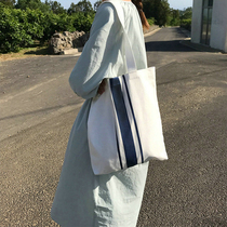 Summer new chic shoulder canvas bag ins super fire bag Korean version of the student portable art school bag female canvas bag