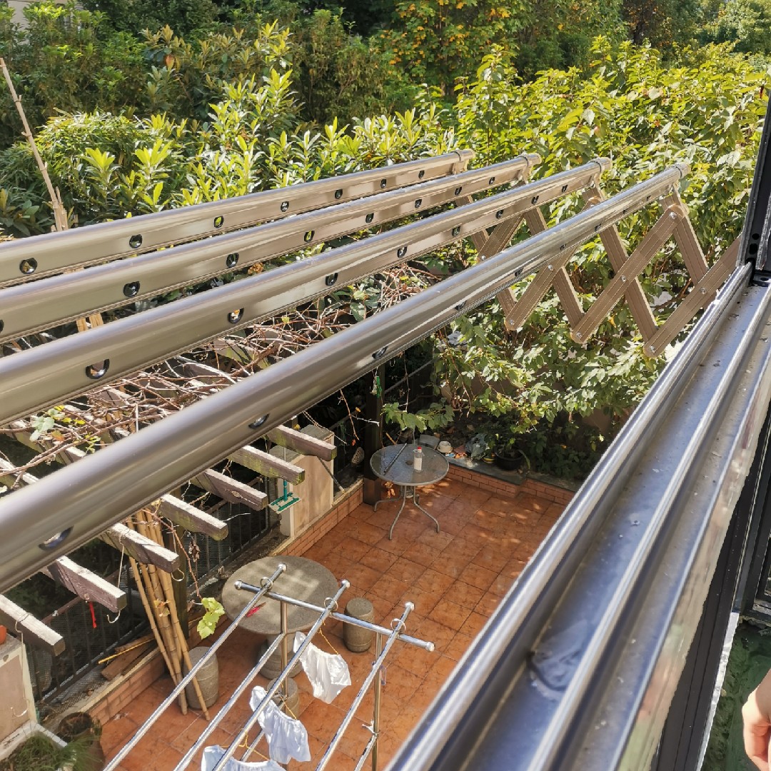 Shanghai titanium alloy reinforced push-pull hanger outdoor telescopic clothes hanger bag installation