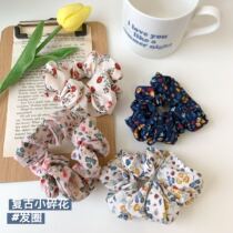 A glimpse of this years fire gentle retro little flower Hairband come