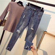 Hong Kong large size 200 pounds fat mm high waist nine-point hole jeans womens spring and autumn loose thin stretch pants