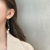 Long size pearl spiral pendant earrings Female face thin personality ear line Wave design sense tassel ears