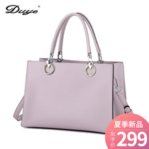 2021 new bag womens large capacity simple wild one shoulder oblique cross commuter soft leather big bag mom handbag