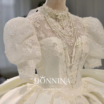 Donnina French satin wedding dress 2022 new main yarn Long sleeves Bubble Sleeves Senior Texture Long Trailing Palace Wind