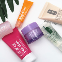 Hand with Clinique small and medium sample collection skin care clean butter remover