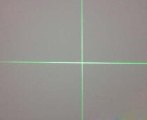 Green light laser module for cross wire