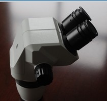 0 65-5 5x continuous magnification lens