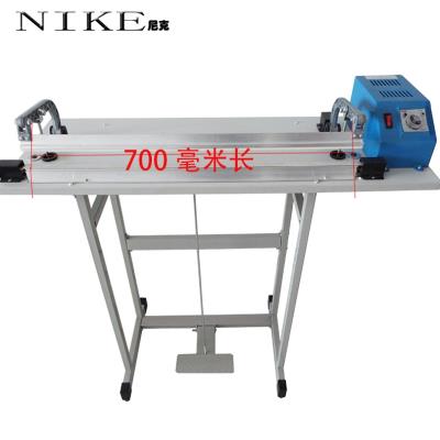 Plastic sealing type 600400 machine Step foot cut through plastic bag film packaging machine Foot shrink film machine machine