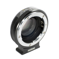 Metabones Speed Booster 0 64 NF in the scene with M4 3 reduction focal adapter ring NF-MFT