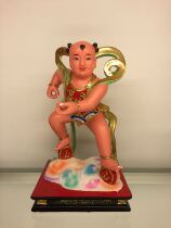 Wooden statue custom belly prince Nezha prince incense camphor wood lacquer line carving produced by Huiyige 25 cm