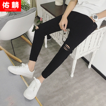 Hole casual jeans ins spring Korean version slim net red small feet trend beggar pants mens nine-point pants 9 points