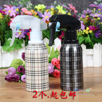 Two aluminum watering cans Plaid spray bottles Hair salon hairdresser with watering cans fine mist