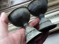 The clear bronze Buddha is dedicated to the oil lamp pair