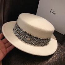 French autumn and winter British ladies tide girl white bow flat top wide eaves small top hat wool wool felt hat Net Red