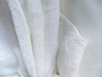 Pure white long wool flannel fabric mobile phone counter decorated plaid laid with background fluff cloth