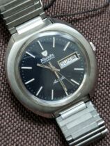 New sixties old stock Swiss Nevida automatic double calendar mens mechanical watch original signature