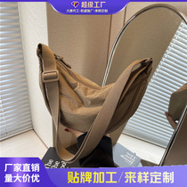 Casual sports style canvas bag for women 2024 new niche design simple and versatile crossbody bag dumpling bag for women
