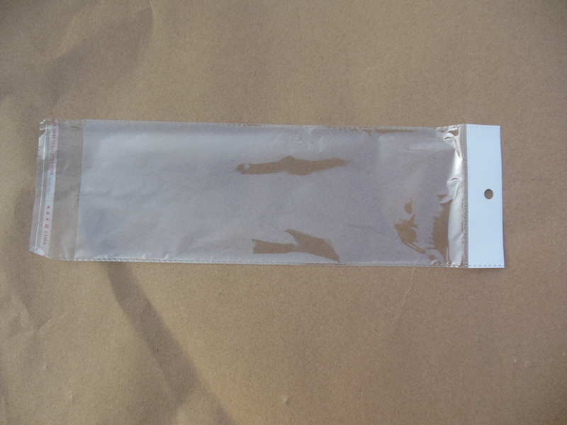Insole bag OPP white clamping head slagging hole self-adhesive closure bag Ornament Bag Transparent Packing Bag 13 * 39100