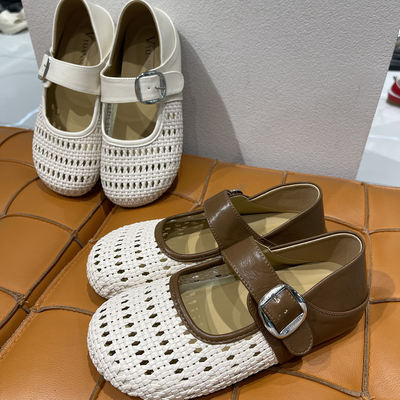 Women's summer sandals with soft soles are not tiring to the feet. Pair them with a skirt with a shallow opening, one-button weave and cutout. Two pairs of Mary Jane croats