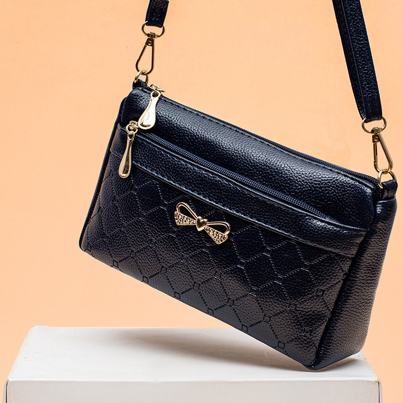 2022 new women's bag shoulder messenger bag simple net red ladies bag stall supply retro waterproof shopping bag