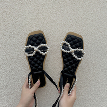 Sandals 2021 New ladies Summer flat-bottomed fairy Wind pearl butterfly knot Toe Soft Bottom Line of Roman Shoe