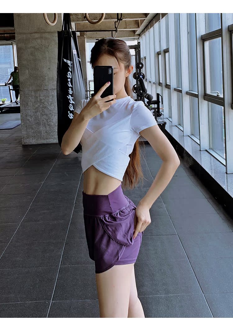 Hem chéo quần áo tập thể dục rốn gợi cảm nữ mỏng căng chặt yoga ngắn tay chạy nhanh áo thun thể thao khô - Áo phông thể thao áo tanktop nữ