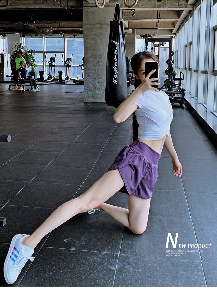 Hem chéo quần áo tập thể dục rốn gợi cảm nữ mỏng căng chặt yoga ngắn tay chạy nhanh áo thun thể thao khô - Áo phông thể thao áo tanktop nữ