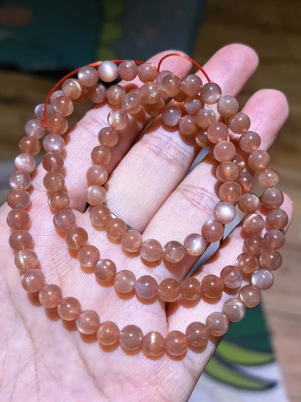 Natural Sunstone Multi-Circle Bracelet, with a Fresh, Light Orange Color That Looks Very Ethereal When Worn. Natural Sunstone Multi-Circle Bracelet, with a Fresh, Light Orange Color That Looks Very Ethereal When Worn.