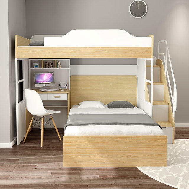 two bunk beds with desk