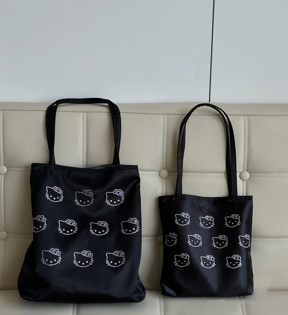 2024 ໃຫມ່ Kitty ຮ້ອນເພັດກາຕູນງາມເດັກຍິງຜ້າໄຫມ handbag shoulder bag ins high-end women's bag