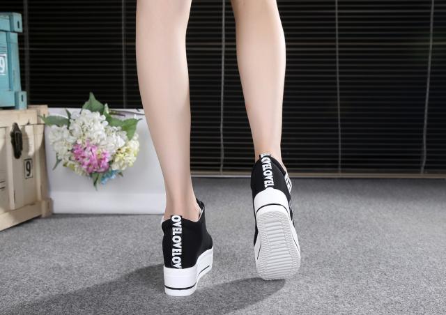 Giày vải cô gái tăng và thấp để giúp giày đế dày muffin hoang dã Giày đế xuồng màu đen và trắng thông thường giày puma nữ chính hãng
