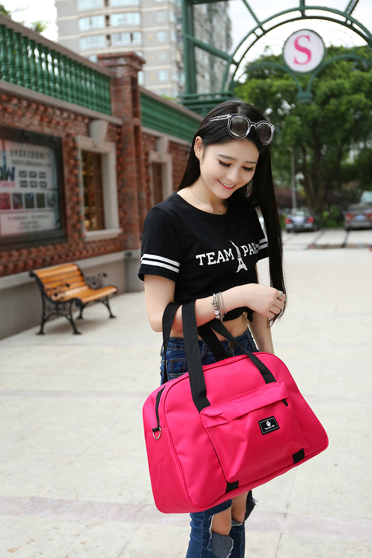 Túi du lịch chống nước Hàn Quốc túi du lịch khoảng cách ngắn có thể được đặt túi xe đẩy túi du lịch nam và nữ túi thể dục ba lô du lịch loại lớn