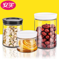 Ann bought a sealed jar glass with a lid to store storage cans of grains and candy cans of passion fruit lemon honey cans