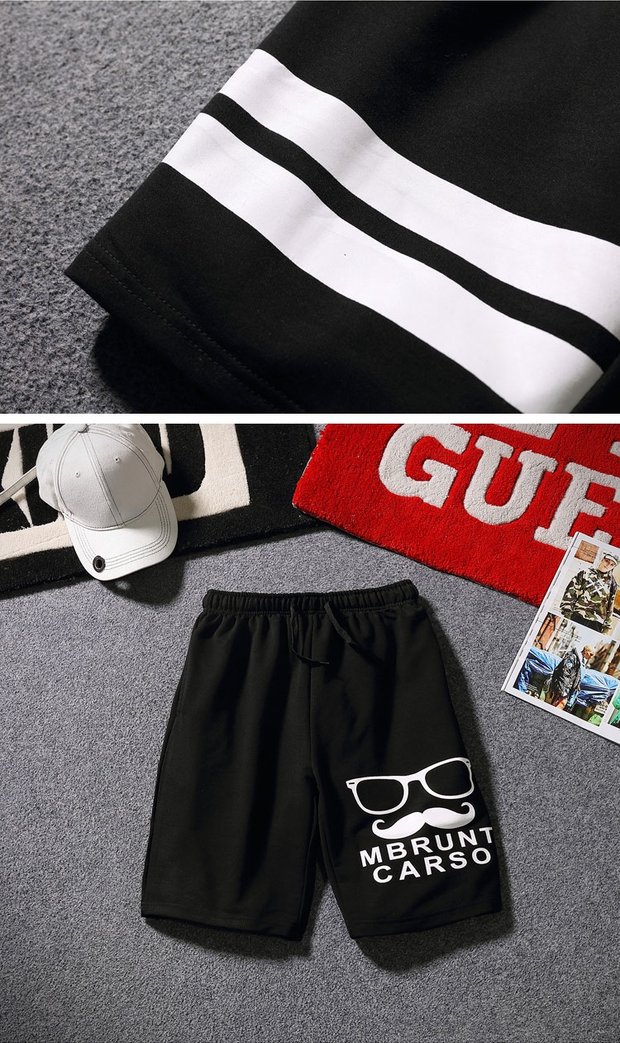 18 người đàn ông mới thường ngủ quần short bé trai 5 điểm quần rộng bím tóc mùa hè nửa quần nửa chân đơn giản nhàn nhã quần short kaki nam