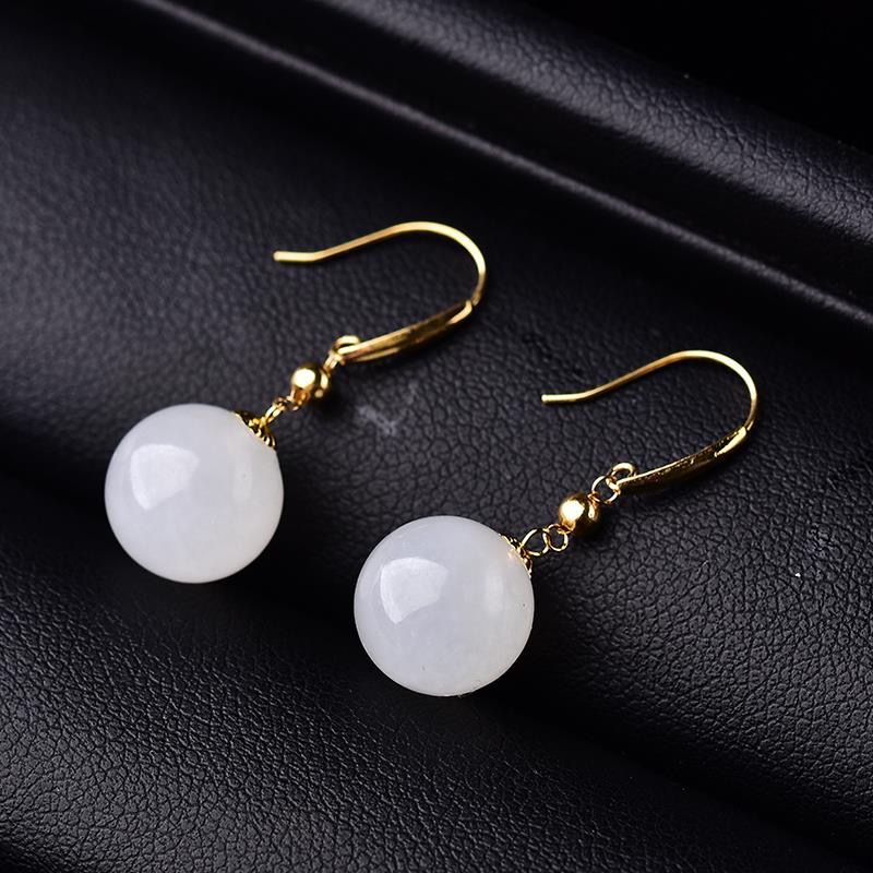 Natural Xinjiang Hetian mutton fat jade earrings women's simple white fine run transfer round beads sterling silver inlaid earrings hypoallergenic