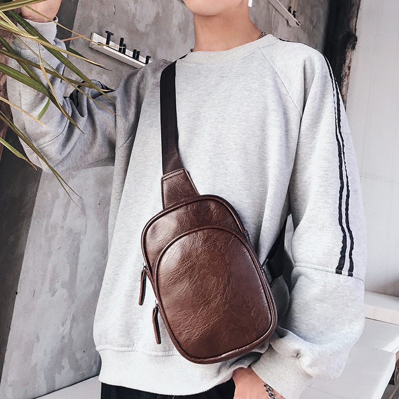 New simple leather fashion small bag Korean version of the new leather shoulder bag Youth outdoor small backpack diagonal bag