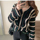 Autumn new Korean version of v-neck long-sleeved knitted sweater top women's contrast color vertical stripes horn pullover design sense sweater