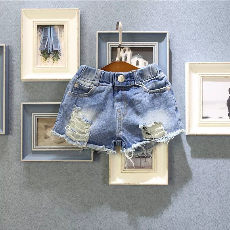 Trẻ em 2020 Quần áo trẻ em Hàn Quốc trẻ em trai và gái mùa hè thời trang mới xé quần short denim quần unisex hot - Khác